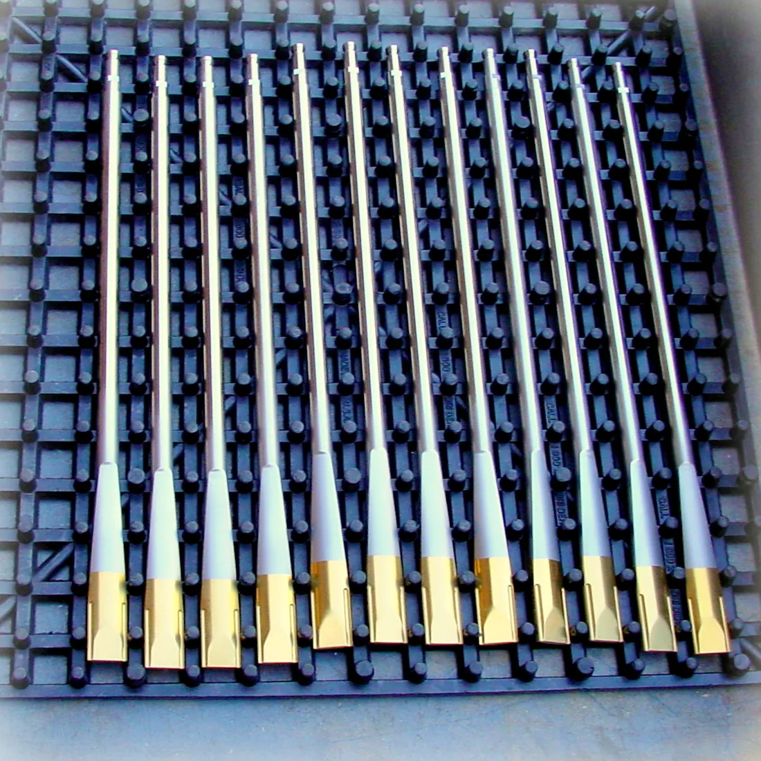 TiN-coated medical instruments with gold working ends in a coating tray